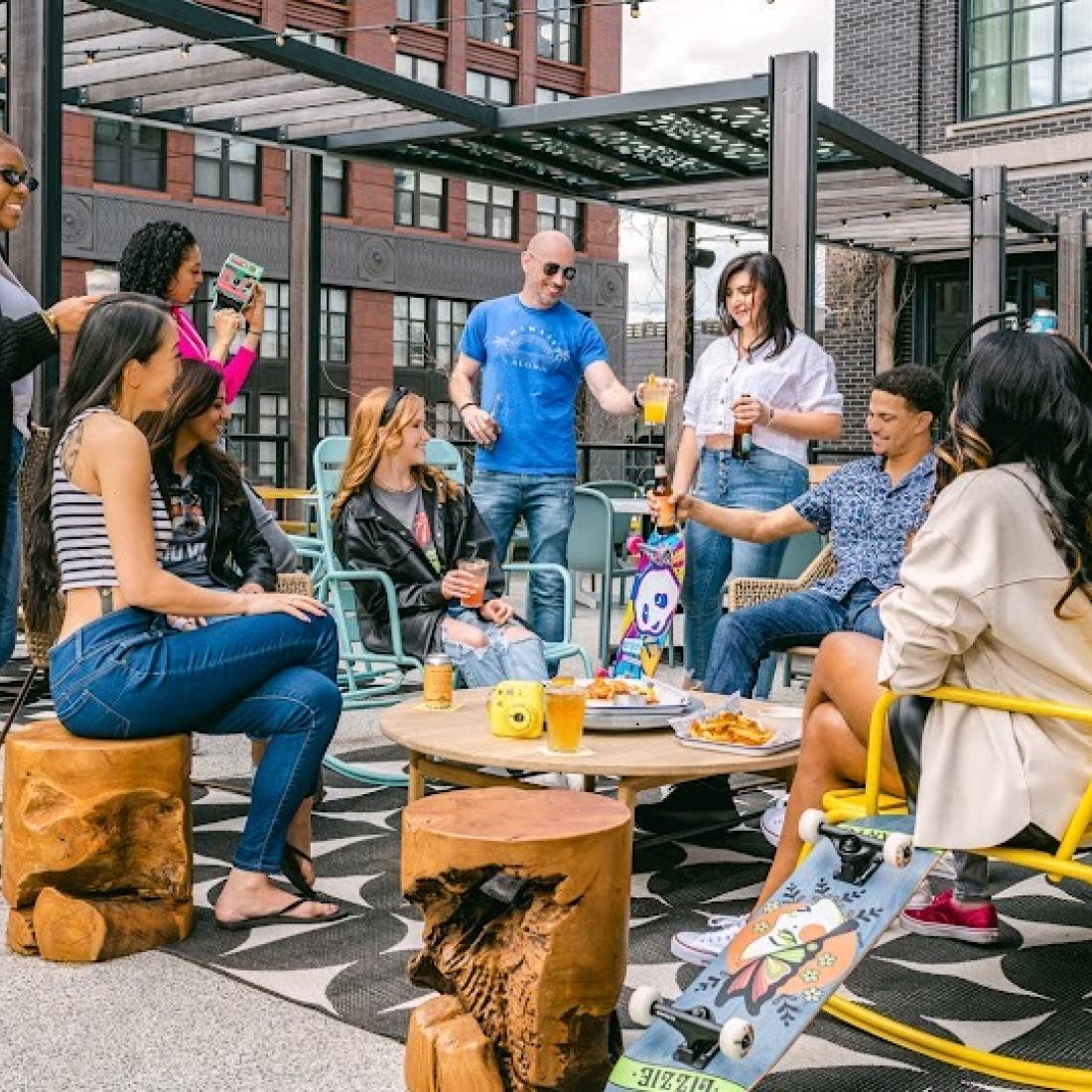 A group of people gathered on the patio