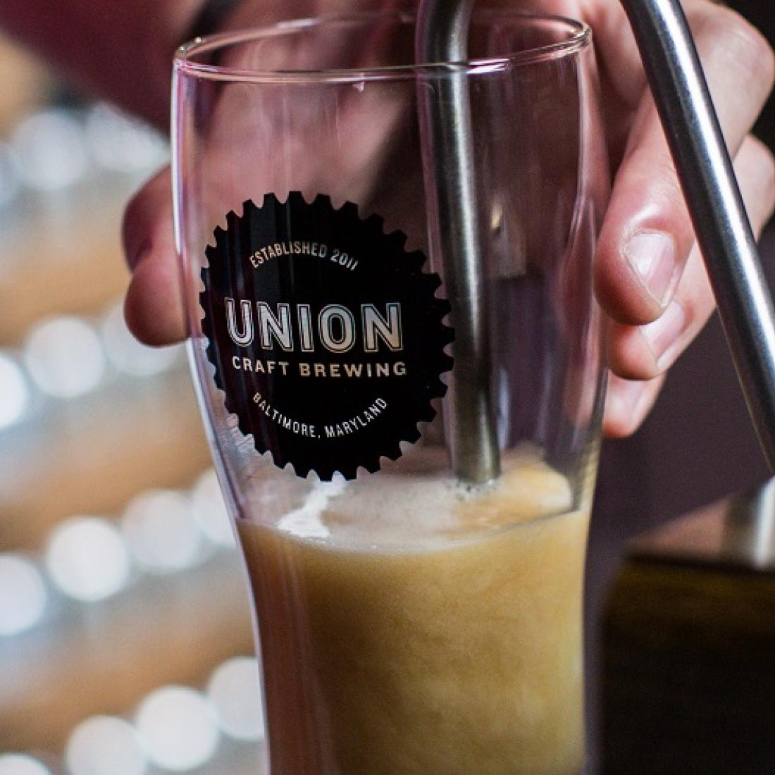 A stout being poured Union Craft Brewing in Baltimore, Maryland, USA