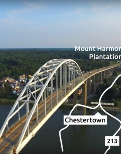 A large metal bridge crossing over a river